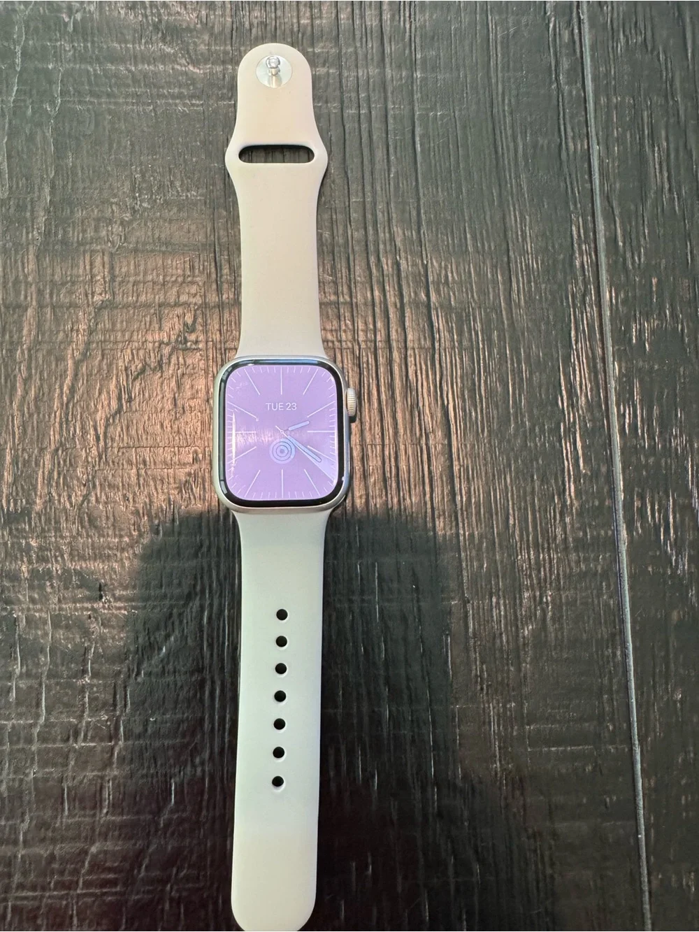 Apple Watch with Pink Display and Light Gray Band